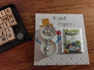 Kerstkaartje met sneeuwpop voor de juf of meester